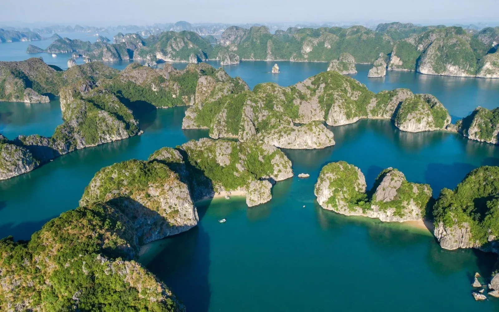 Secluded Lan Ha Bay with kayaks and limestone islands Bali