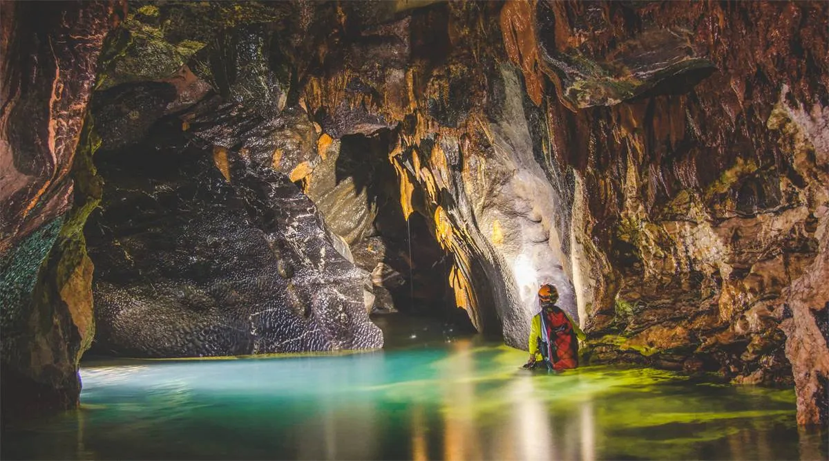 Hang Va Cave unique cone stalagmite formations shallow pools Phong Nha Bali