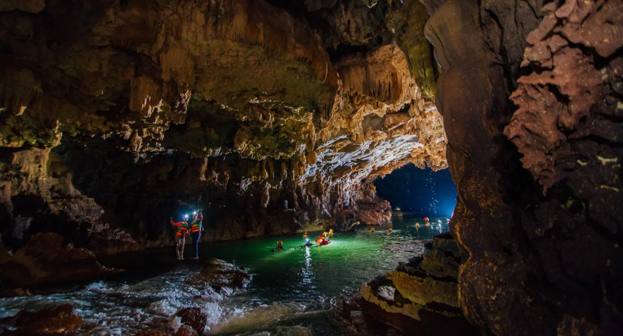 Tu Lan Cave System jungle river swimming expedition Phong Nha Bali
