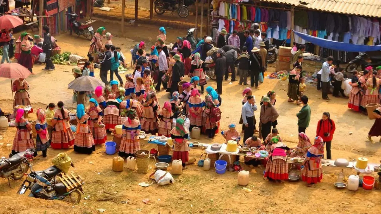 Flower Hmong women in colourful traditional dress at Bac Ha Sunday Market Bali