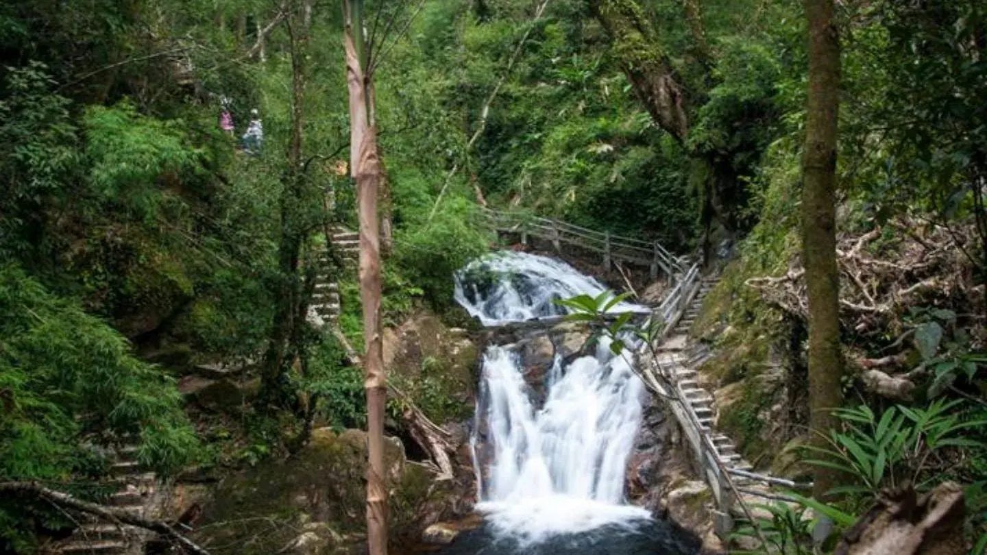 Love Waterfall forest trail and cascade near Sapa Bali